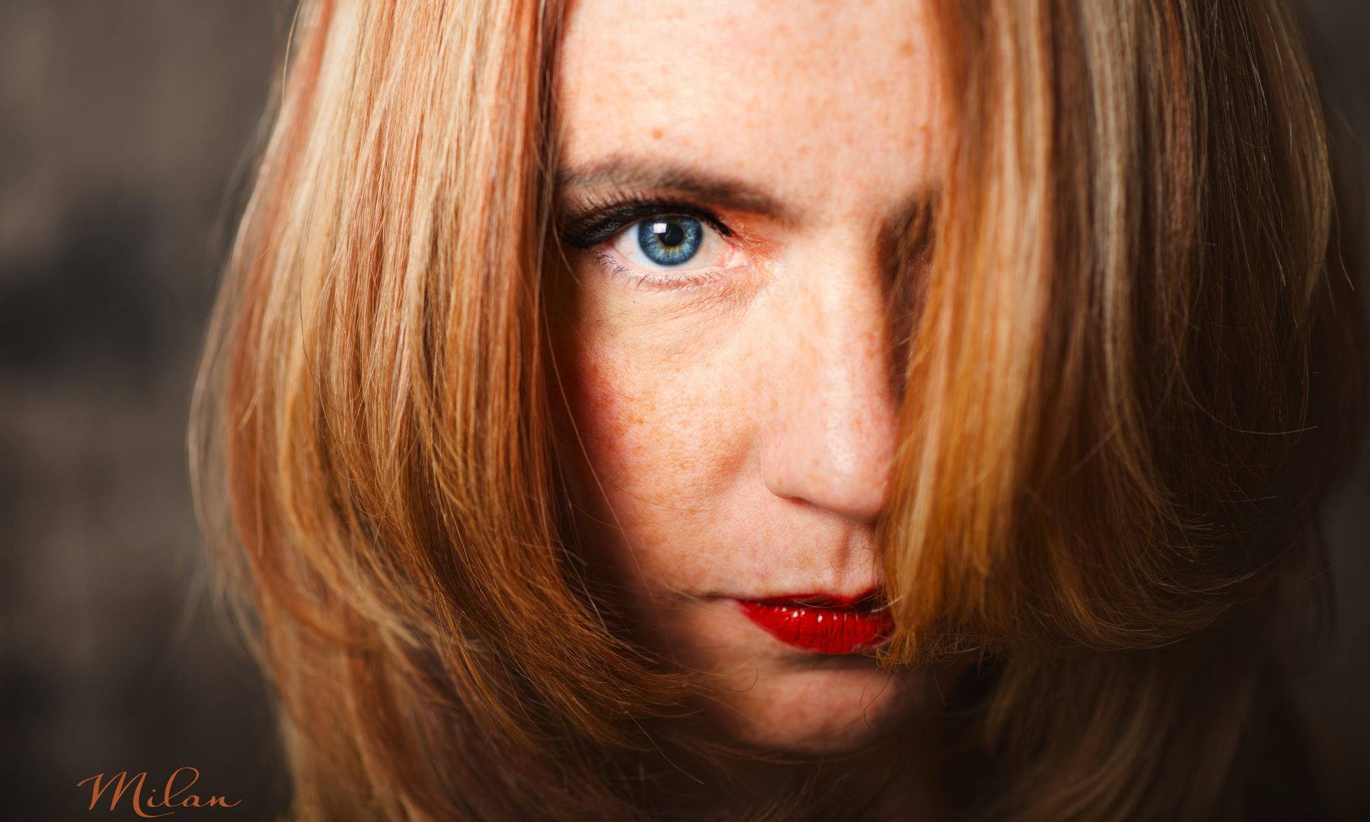 Portrait of Red hired woman with natural makeup